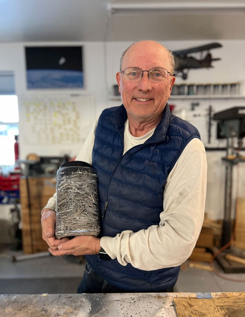 paul with jar of rivet tails