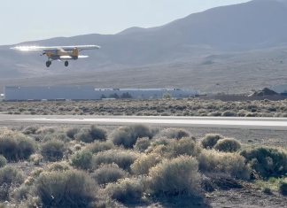 Paul Dye takes off in the NX Cub from his home field in Nevada.
