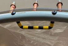 Easy Egress Handle Finished egress handle with striping, fastened in place with #8 screws.