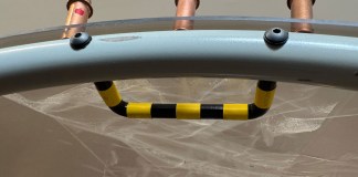 Finished egress handle with striping, fastened in place with #8 screws.