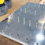 Clecos in an airplane panel illustrating the many repetitive task