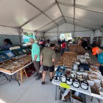 First Stop—Stock Up! B&B Aircraft Supply tent