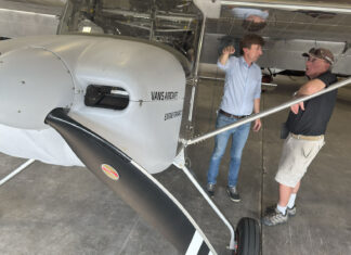 Van’s Aircraft Chief Engineer Rian Johnson explains the RV-15 design elements to Dye before Dye’s initial flights last summer.