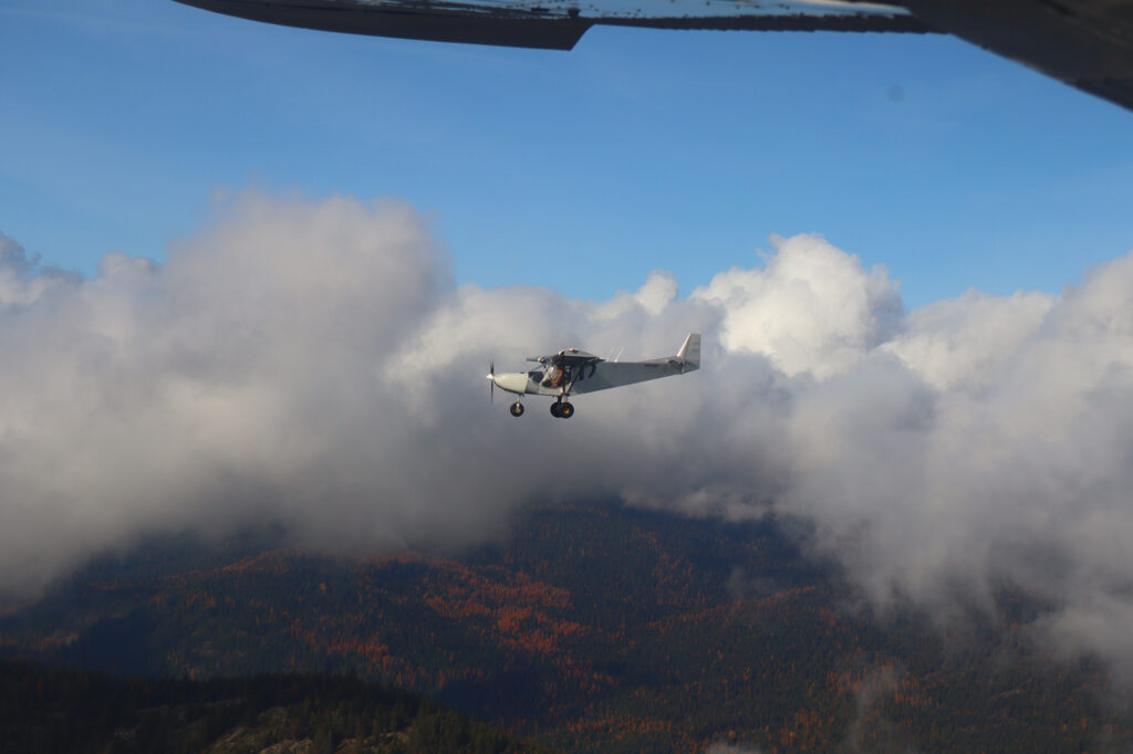 On its maiden flight, the Zenith CH750 STOL soars above the mountains of North Idaho. [Credit: North Idaho High School Aerospace Program]