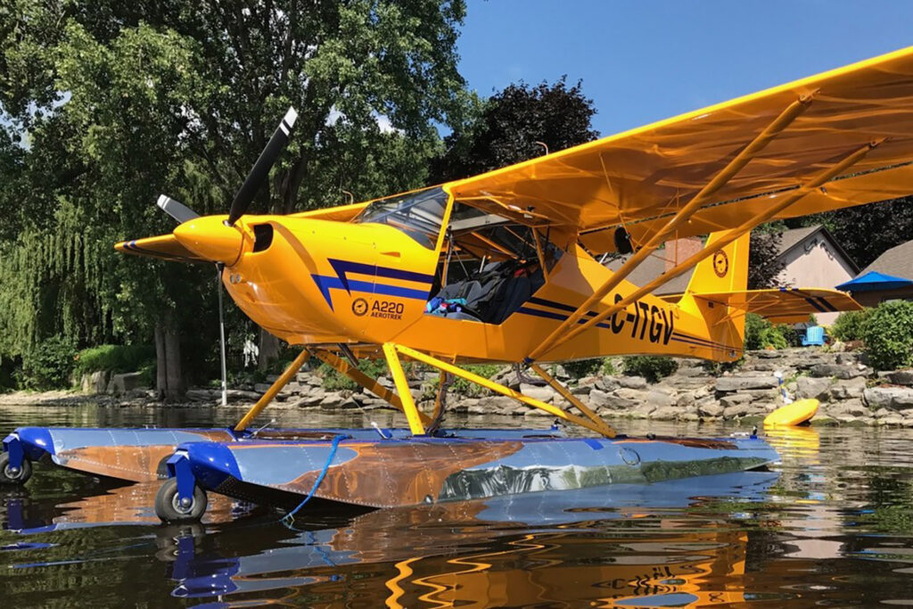 The Aerotreks can be operated on conventional landing gear, skis, straight floats, or aluminum amphibious floats. Both 100 hp and the 115 hp Rotax turbo engines provide sufficient performance for float operations. [Credit: Aerotrek]