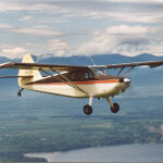 The author flying his Sinson 108-2 Voyager in the skies above British Columbia, Canada. [Credit: Mike Davenport]