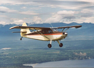 The author flying his Sinson 108-2 Voyager in the skies above British Columbia, Canada. [Credit: Mike Davenport]