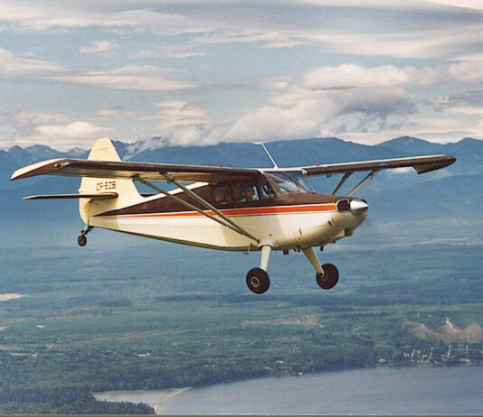 The author flying his Sinson 108-2 Voyager in the skies above British Columbia, Canada. [Credit: Mike Davenport]