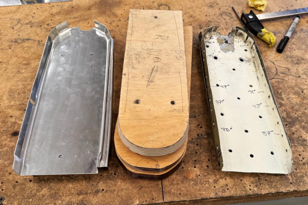 Left to right, shiny new bulkheads, wooden form blocks, and old bulkheads. [Credit Tinley Ong]