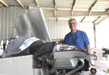 Author Bill Wilson takes a break from measuring and cutting the Lexan windshield during his Onex build. [All Images Credit to Bill Wilson]