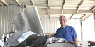 Author Bill Wilson takes a break from measuring and cutting the Lexan windshield during his Onex build. [All Images Credit to Bill Wilson]