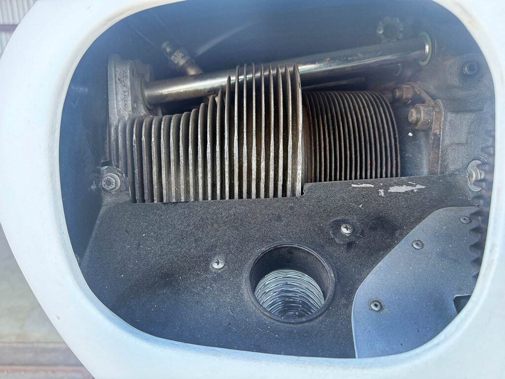 Air flowing through the cowling incurs a significant amount of drag as it enters the cowl, slows, flows around the cylinders, through oil-coolers, and out the exit. [Credit: Andrew Robinson]