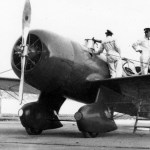 The Granville Brothers Gee Bee R-6 “Q.E.D.” being serviced before the 1934 MacRobertson Air Race; Mid America Flight Museum flies a replica of this aircraft. [Credit: Wikimedia Commons]