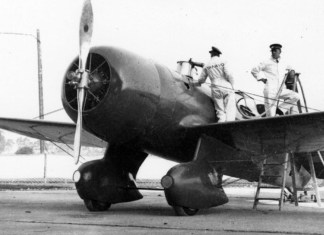 The Granville Brothers Gee Bee R-6 “Q.E.D.” being serviced before the 1934 MacRobertson Air Race; Mid America Flight Museum flies a replica of this aircraft. [Credit: Wikimedia Commons]