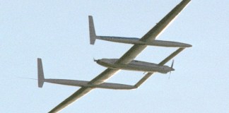 The Rutan Model 76 Voyager circles Edwards Air Force Base in December 1986 as Dick Rutan and Jeana Yeager complete the first nonstop, unrefueled flight around the world. [Credit: NASA Armstrong Flight Research Center]