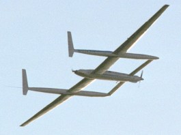 The Rutan Model 76 Voyager circles Edwards Air Force Base in December 1986 as Dick Rutan and Jeana Yeager complete the first nonstop, unrefueled flight around the world. [Credit: NASA Armstrong Flight Research Center]