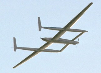 The Rutan Model 76 Voyager circles Edwards Air Force Base in December 1986 as Dick Rutan and Jeana Yeager complete the first nonstop, unrefueled flight around the world. [Credit: NASA Armstrong Flight Research Center]