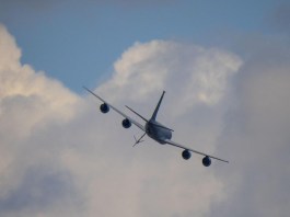 The week ahead: a KC-135 tanker passes over the grounds at EAA AirVenture Oshkosh, where Phillips 66 will set up at tents #430 and #431. [Credit: USDA Forest Service]