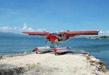 A Zenith STOL CH701 on Zenair amphibious floats rests on a sandbar on the Caribbean island of Guadeloupe. [Credit: Zenith Aircraft]