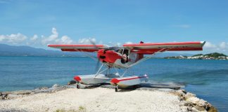 A Zenith STOL CH701 on Zenair amphibious floats rests on a sandbar on the Caribbean island of Guadeloupe. [Credit: Zenith Aircraft]