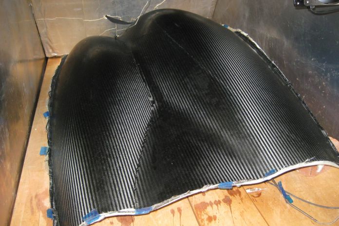 Lower left cowl in the oven for postcuring.