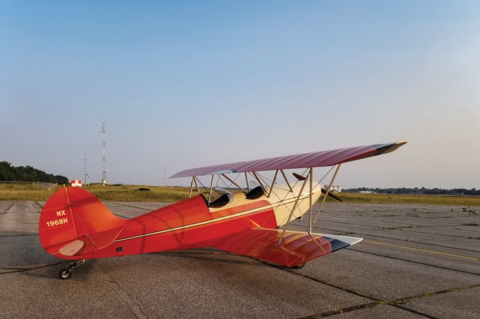 A classic Hatz Bantam Biplane basks in the late afternoon sun. [Credit: Hatz Biplane Association]