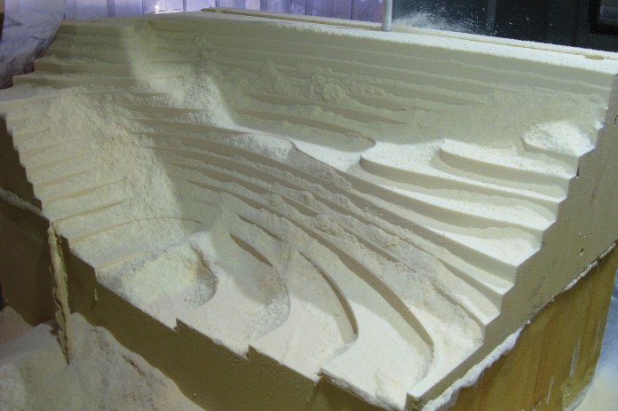Bottom right cowl in the CNC after the roughing pass.