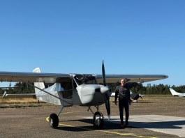 Builder and pilot Mark Farver stands alongside his Continental IOX-340 powered RANS S-21. [Credit: Mark Farver]