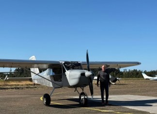 Builder and pilot Mark Farver stands alongside his Continental IOX-340 powered RANS S-21. [Credit: Mark Farver]