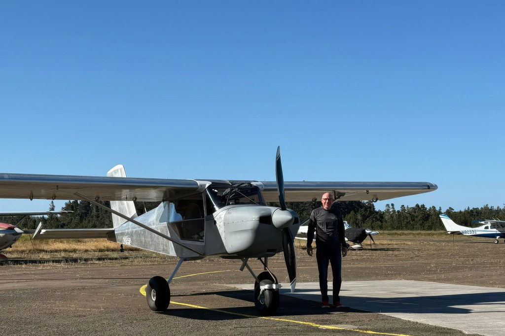 Builder and pilot Mark Farver stands alongside his Continental IOX-340 powered RANS S-21. [Credit: Mark Farver]