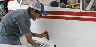 Maintenance technician William Vergonet conducts an inspection on a Cub. [Credit: Lisa Turner]
