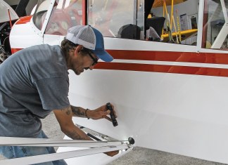 Maintenance technician William Vergonet conducts an inspection on a Cub. [Credit: Lisa Turner]