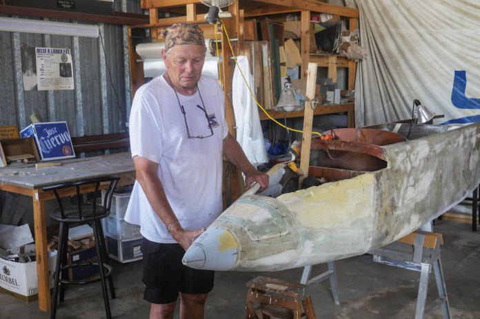 Jack Repass stands by the custom work he has done on his Long-EZ. Because of his stature, Jack had to extend the fuselage nose area to accommodate longer legs. At the same time he moved the battery forward to handle weight and balance needs. [Credit: Bill Wilson]